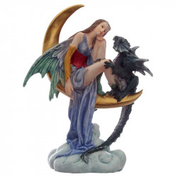 Figurine de Fée assise sur une lune avec un dragon